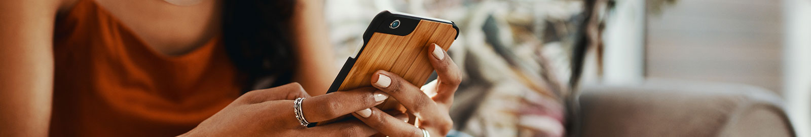 Woman holding mobile phone.